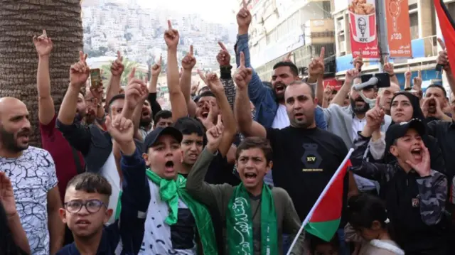 Palestinians protest in the West Bank city of Nablus