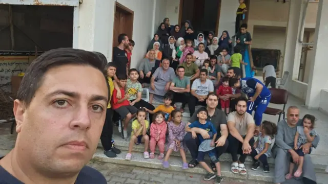 Ibrahim AlAgha and the group of people sheltering in his parents' house