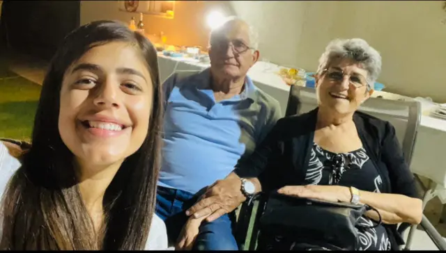 Anad with her grandparents, David and Adina Moshe