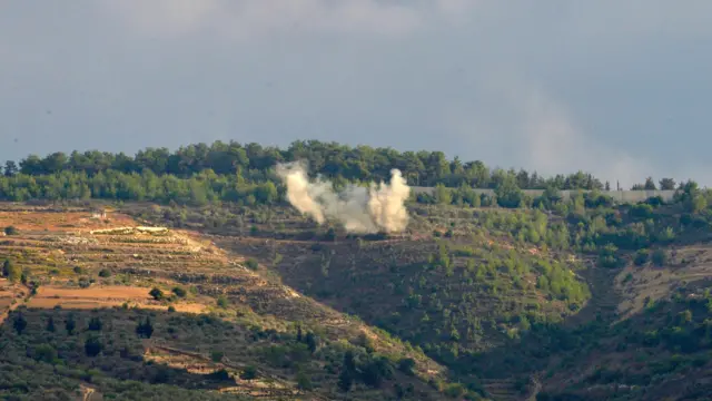 Smoke rises after Israeli army shelling on Al Boustan village, near the Lebanese-Israeli border, southern Lebanon, 19 October 2023