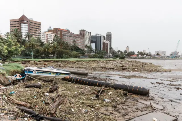 A picture shows massive debris at the Durban harbour following heavy rains, mudslides and rain and winds in Durban, on April 16, 2022