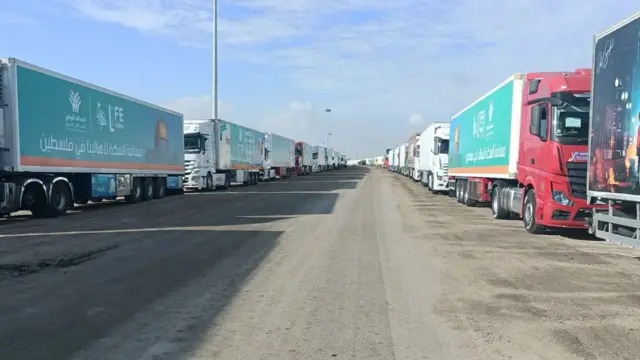 Trucks carrying humanitarian aid from Egyptian NGOs for Palestinians, wait for the reopening of the Rafah crossing at the Egyptian side, to enter Gaza