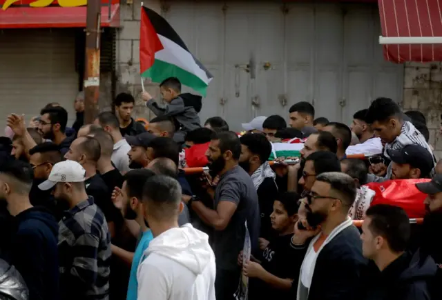 Funeral held for two Palestinians killed in the West Bank