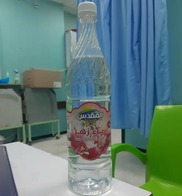 Bottle of vinegar on table in hospital