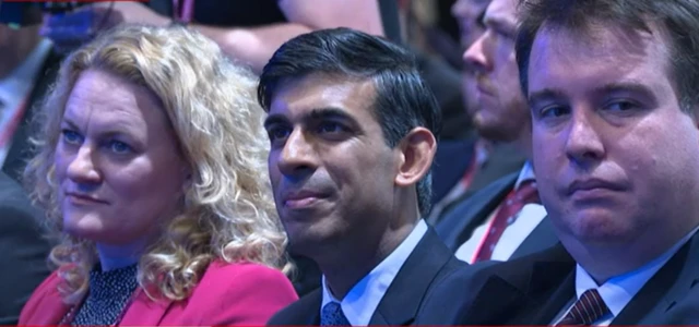 The Prime Minister listens to Jeremy Hunt's speech at the Conservative Party conference