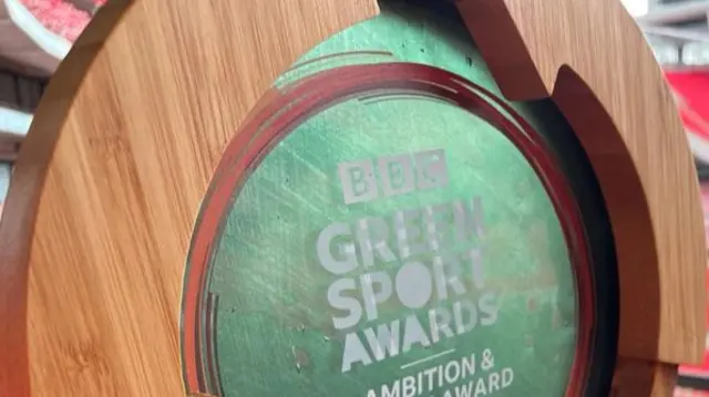 Close up of BBC Green Sport Award trophy