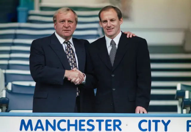 Steve Coppell pictured shaking hands with chairman Francis Lee