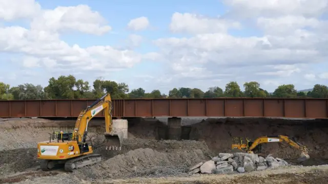 S2 contractors excavating an area below a newly replaced section of the Aylesbury to Princes Risborough branch line track which will allow the high speed rail to pass underneath