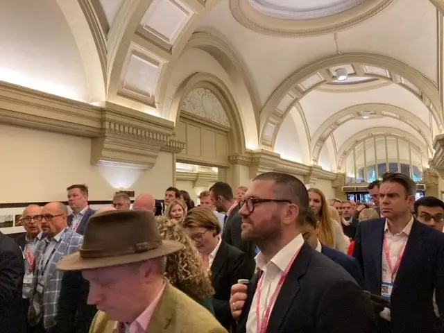 Many people wait in hallway at Conservative Party Conference on 2 October, 2023