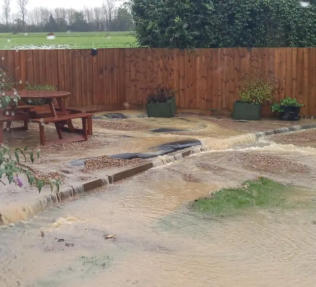 Flooded garden in Hemingstone