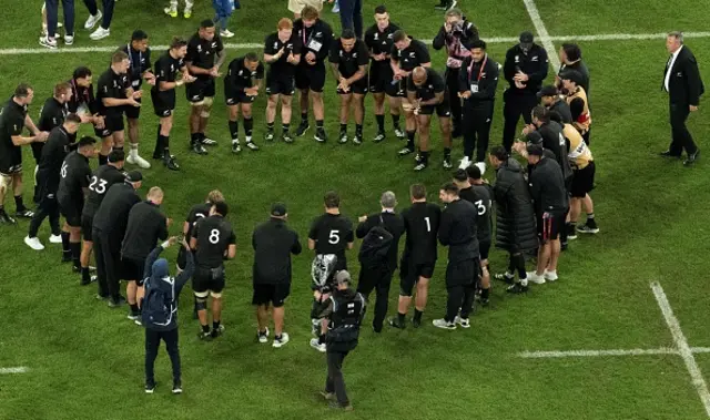 New Zealand's head coach Ian Foster watches as his players applaud