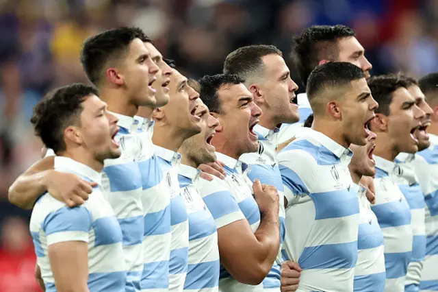 Argentina's players sing their national anthem