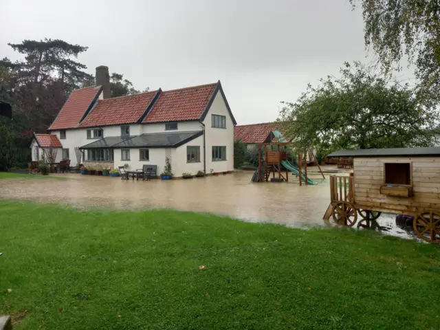 Flooded garden in Hemingstone