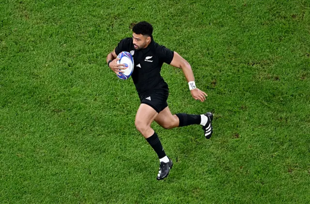 Richie Mo'unga of New Zealand runs with the ball