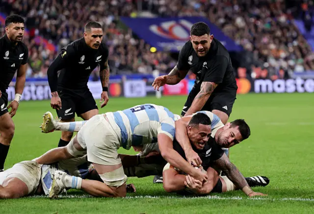 Shannon Frizell of New Zealand scores his team's fifth try