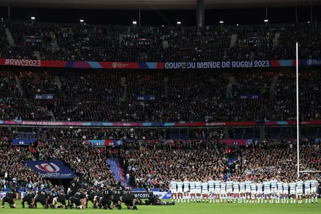 Argentina's players face New Zealand's players performing the haka