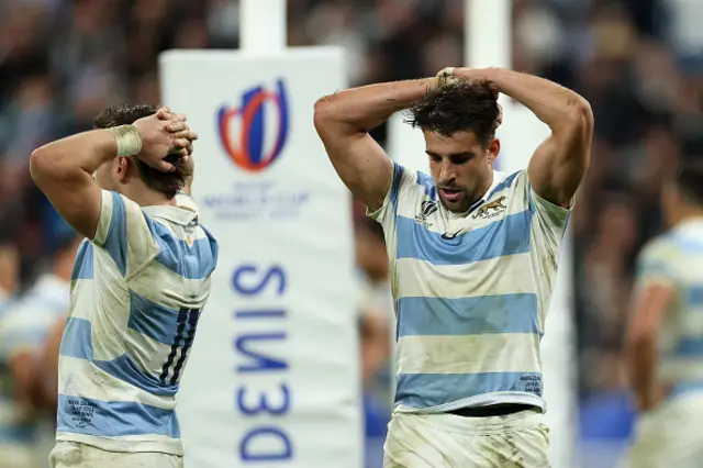 Mateo Carreras and Juan Cruz Mallia of Argentina look dejected