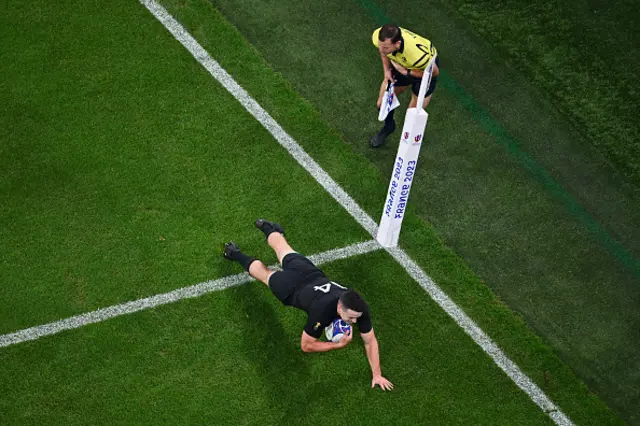 Will Jordan of New Zealand scores his team's sixth try