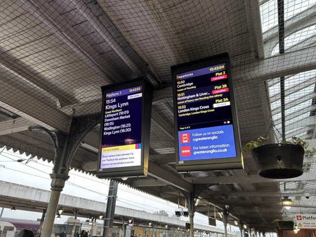 Screens at Ely station showing cancelled trains