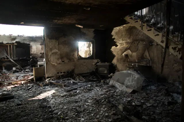 Hamas attackers infiltrated the kibbutz in Be'eri, Israel on 7 October and set homes alight