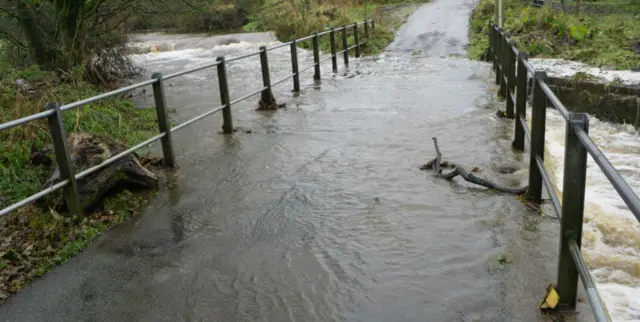 Flooded road in Leek