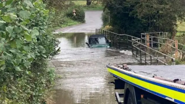 Flooded Trescott ford, in Wombourne