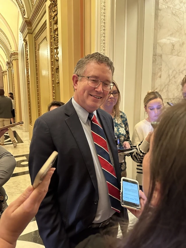 Kentucky Republican Carlos Massie speaks with reporters in the Capitol