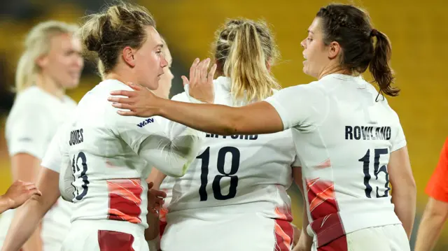 England celebrate a try against Australia