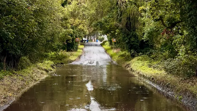 Flooded country lane