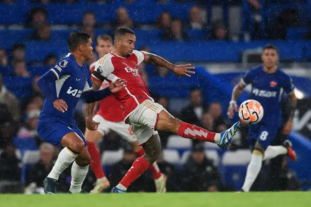 Gabriel Jesus of Arsenal is put under pressure by Thiago Silva of Chelsea