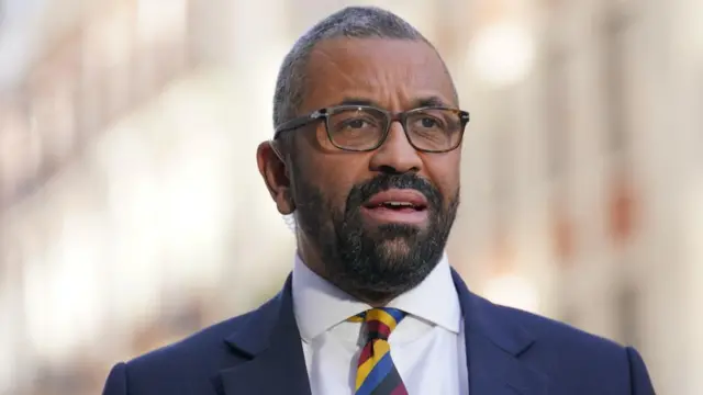 James Cleverly speaks in London