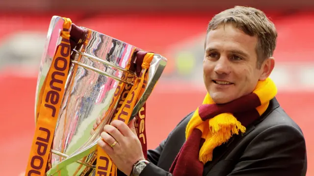 Phil Parkinson with the 2013 League Two play-off final trophy