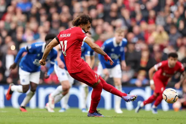 Mohamed Salah of Liverpool scores the team's first goal