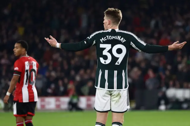 McTominay protests a decision to give handball against him.