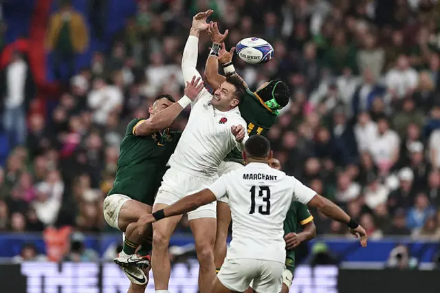 South Africa's left wing Cheslin Kolbe jumps to catch a high ball under pressure