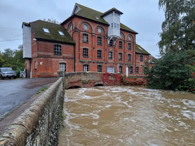 Water level under a bridge is just under the arched waterway