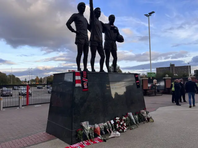 The famous Trinity statue of Charlton, Best and Law at Old Trafford.