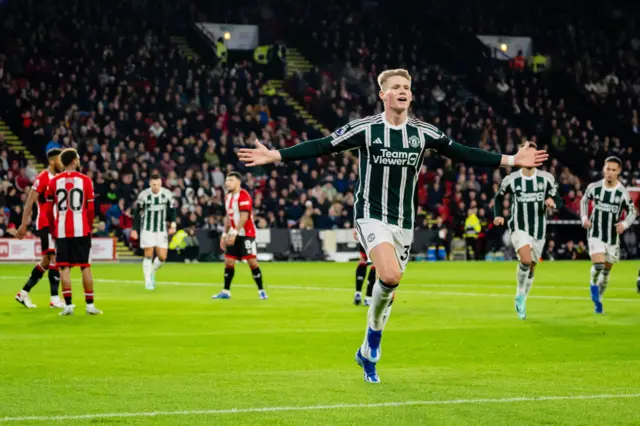 McTominay celebrates towards the United fans after opening the scoring.