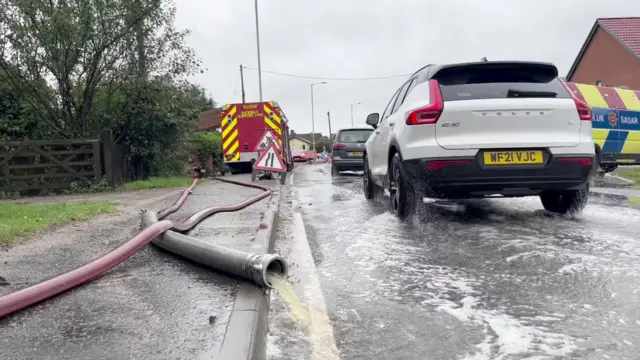 Flood water being pumped away