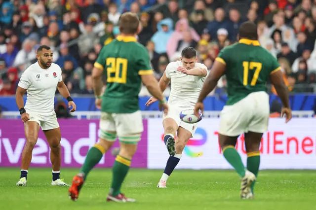 Owen Farrell of England scores a drop goal