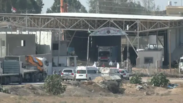 Vans and trucks line up at the border crossing