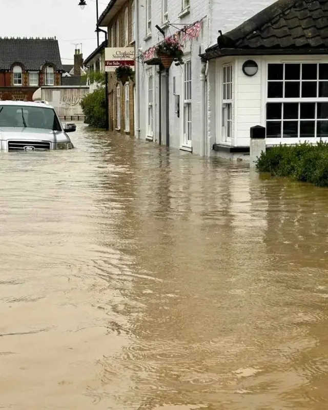 Road outside the pub flooded