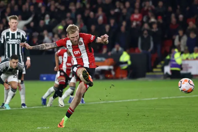 McBurnie slots home the equaliser from the spot.