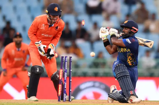 Charith Asalanka is bowled by Aryan Dutt