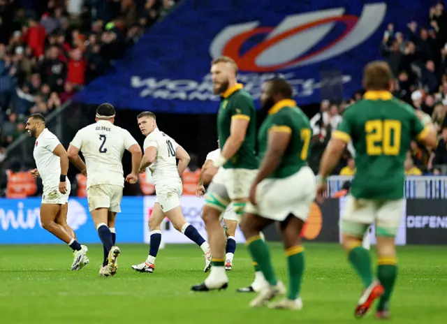 Owen Farrell of England looks on