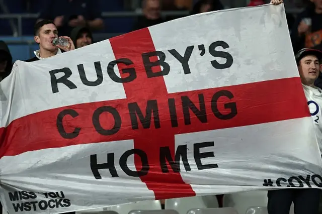 England supporters cheer on their team from the stands