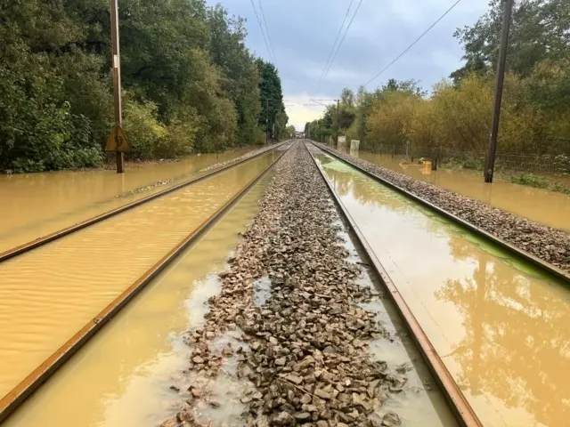 Railway tracks largely under water near Stowmarket.