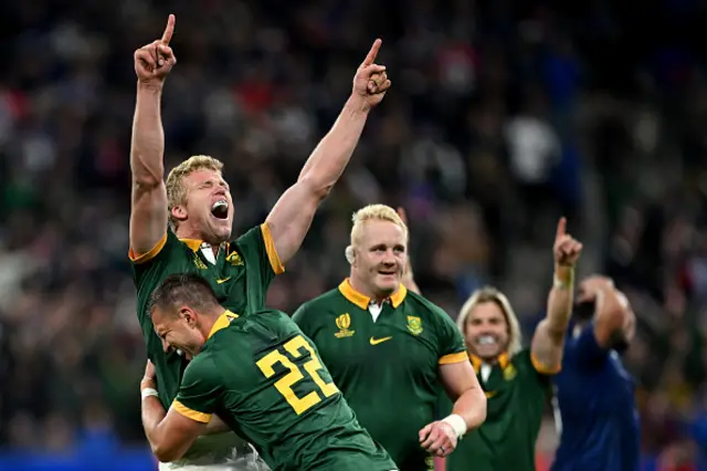 Pieter-Steph Du Toit and Handre Pollard of South Africa celebrate