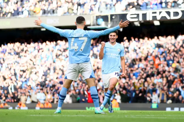 Julian Alvarez of Manchester City celebrates after scoring the team's first goal