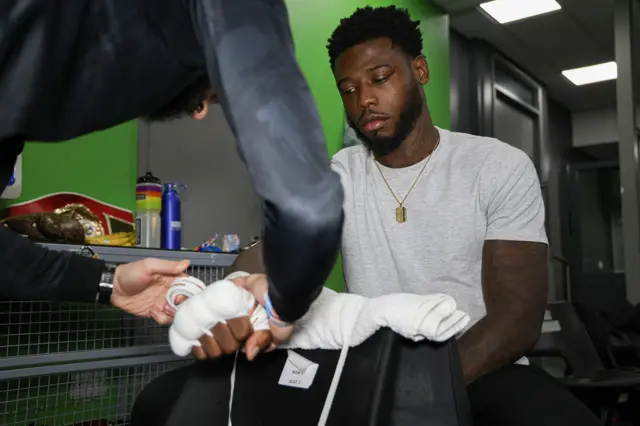 Isaac Chamberlain gets his hands wrapped